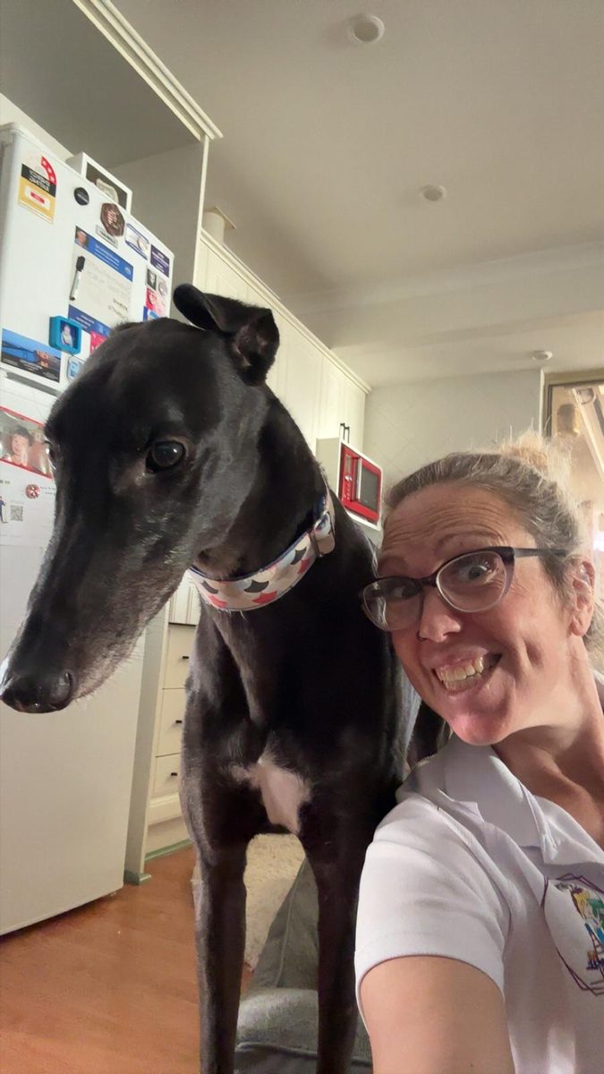 Lou with a client\'s dog