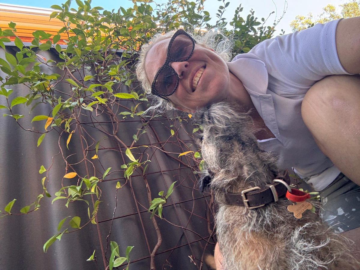 Lou with a client\'s dog